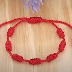pulsera roja 7 nudos